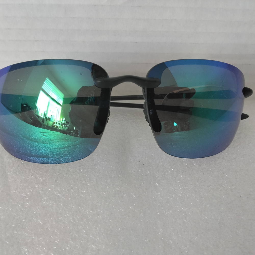 Maui Jim Ho'okipa Xl rimless sunglasses with a black frame and mirrored lenses. 